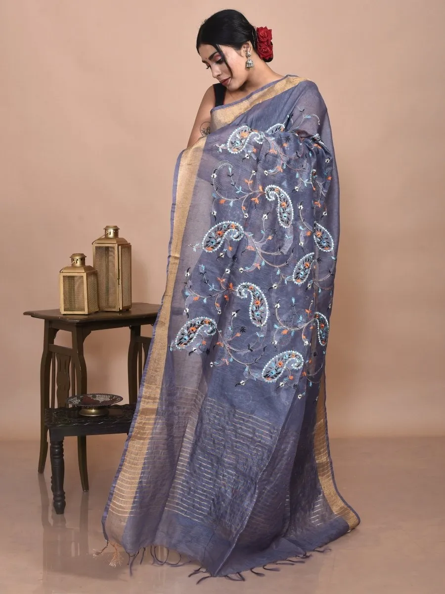 Grey Linen Saree with Kolki Design Machine Embroidery and Golden Zari Border
