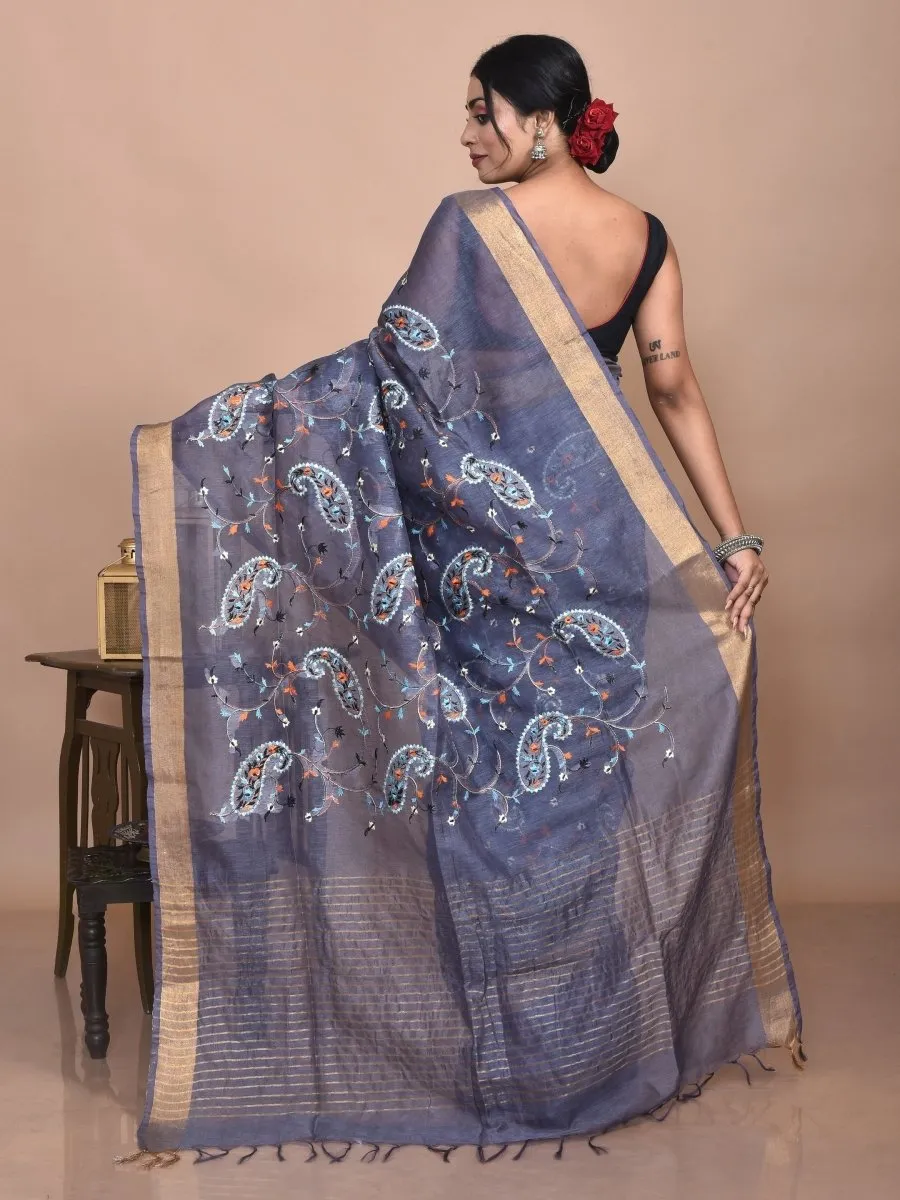 Grey Linen Saree with Kolki Design Machine Embroidery and Golden Zari Border