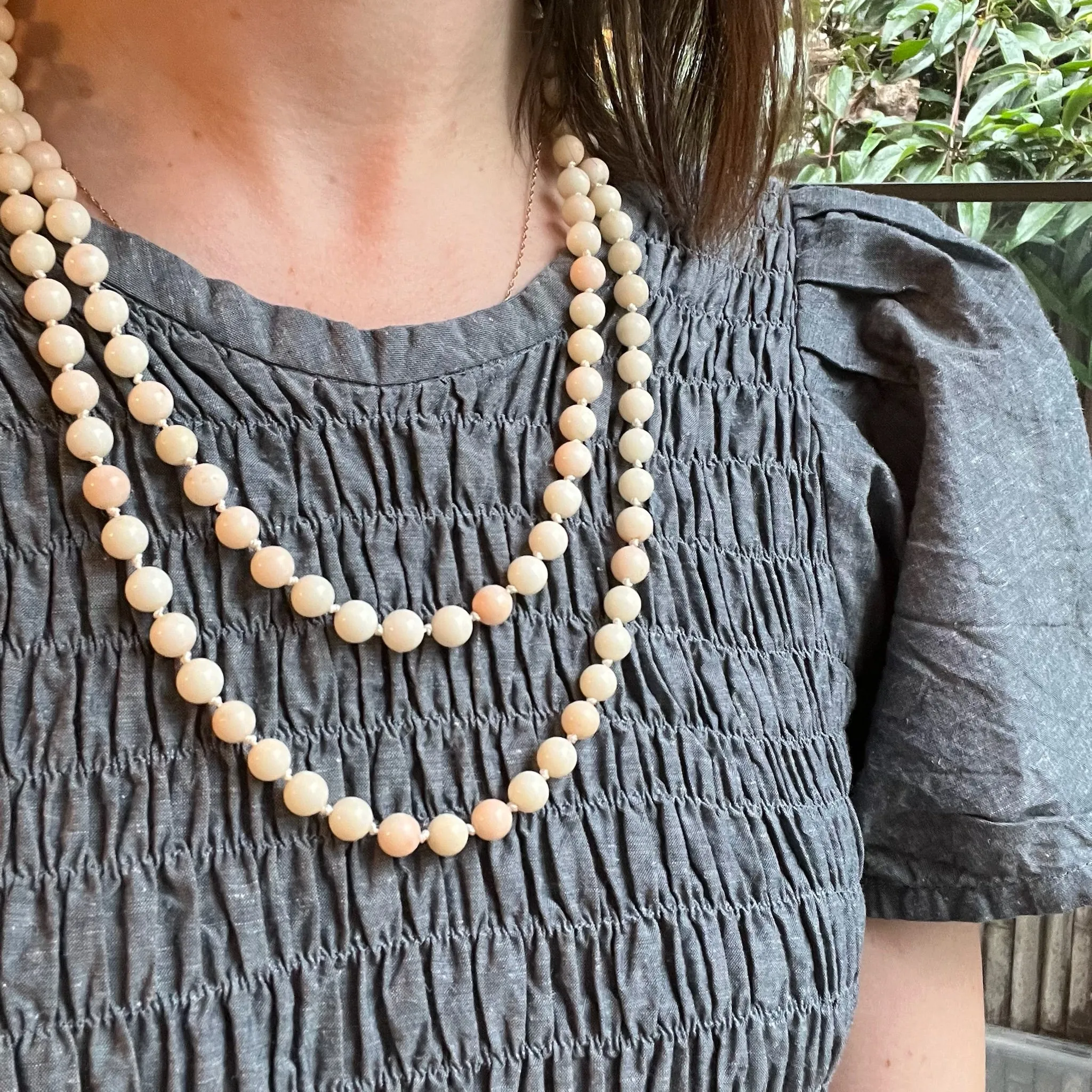 Long Angel Skin Beads with Gold Clasp