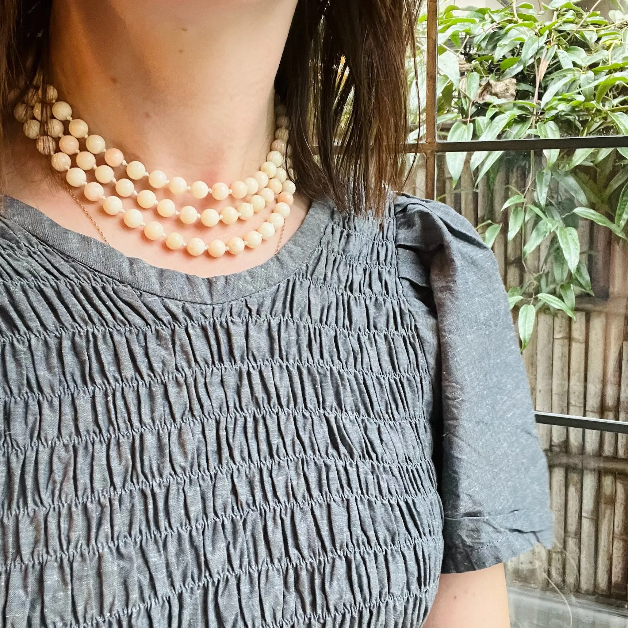 Long Angel Skin Beads with Gold Clasp