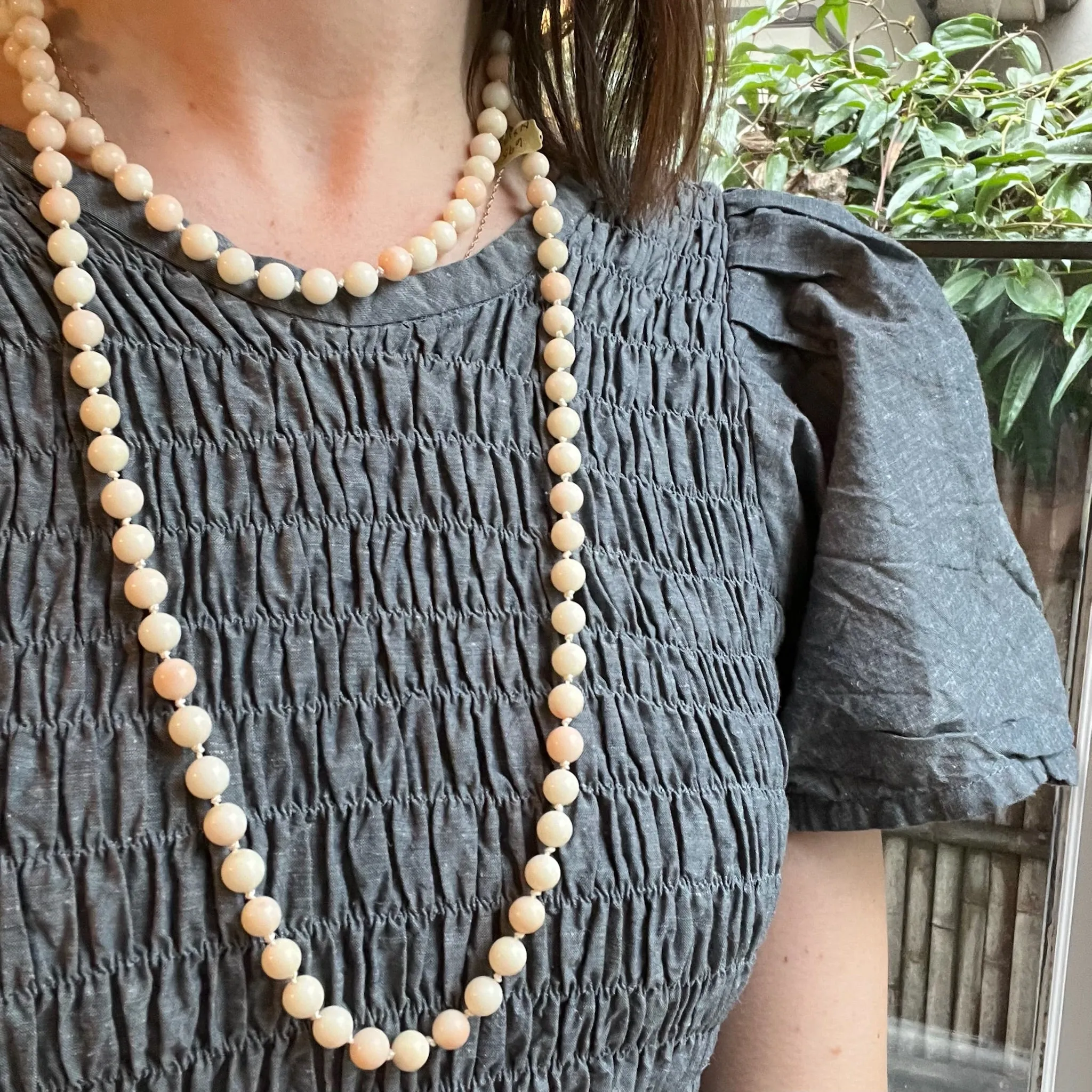Long Angel Skin Beads with Gold Clasp